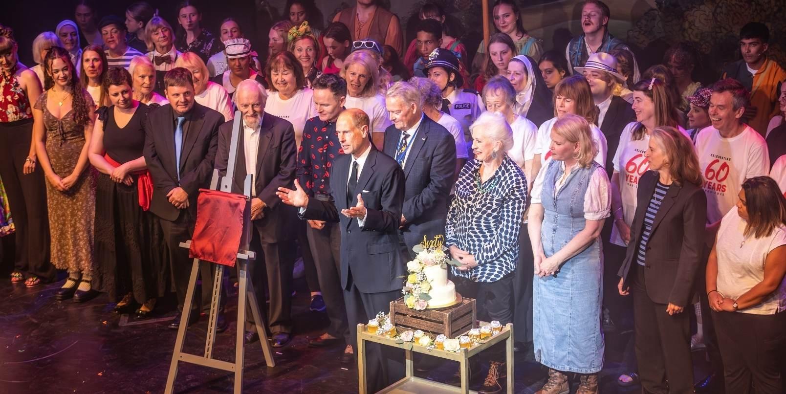 All performers on stage, including His Royal Highness