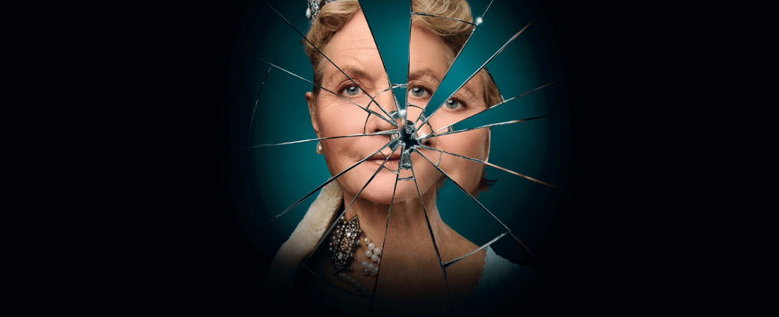 A picture of a womans face fractured into mirror pieces