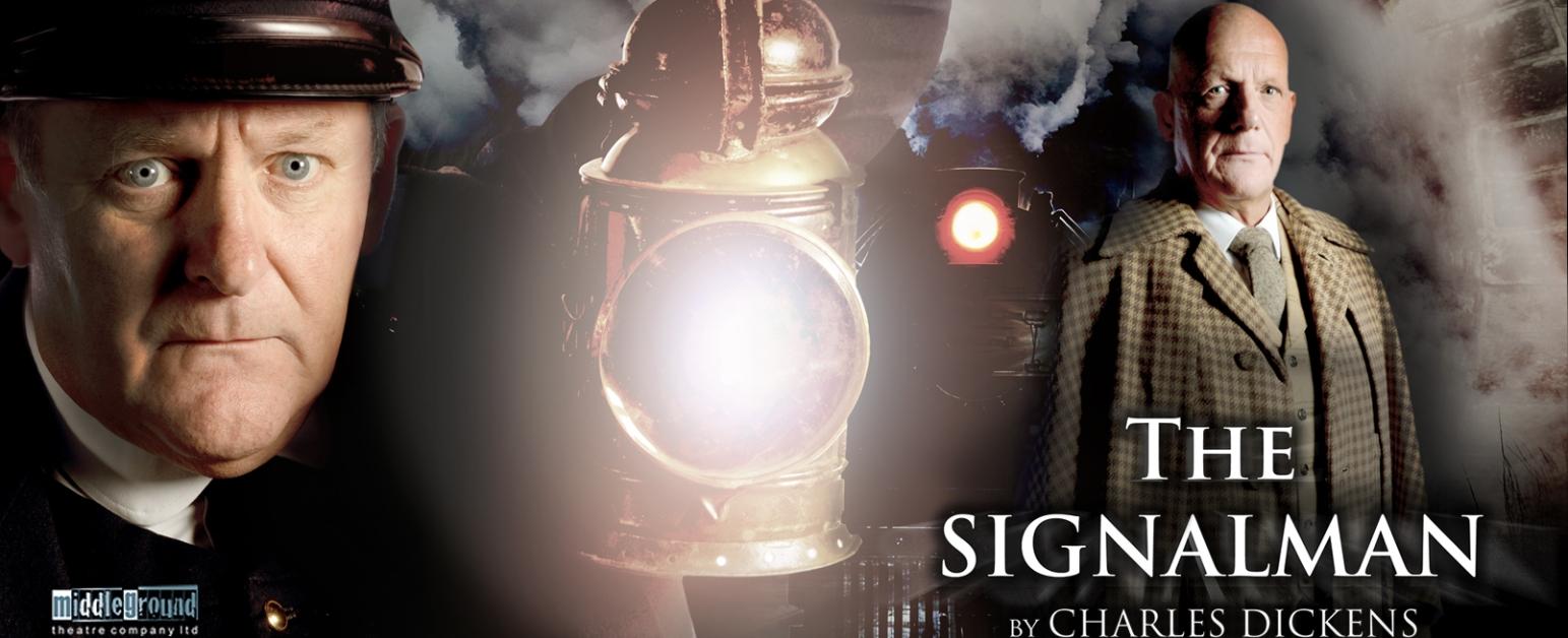 A signalman in a black uniform and hat holds a gaslight up with a man in the background wearing a trenchcoat. Both are looking straight ahead, with very serious expressions. There is a steam train and smoke. 