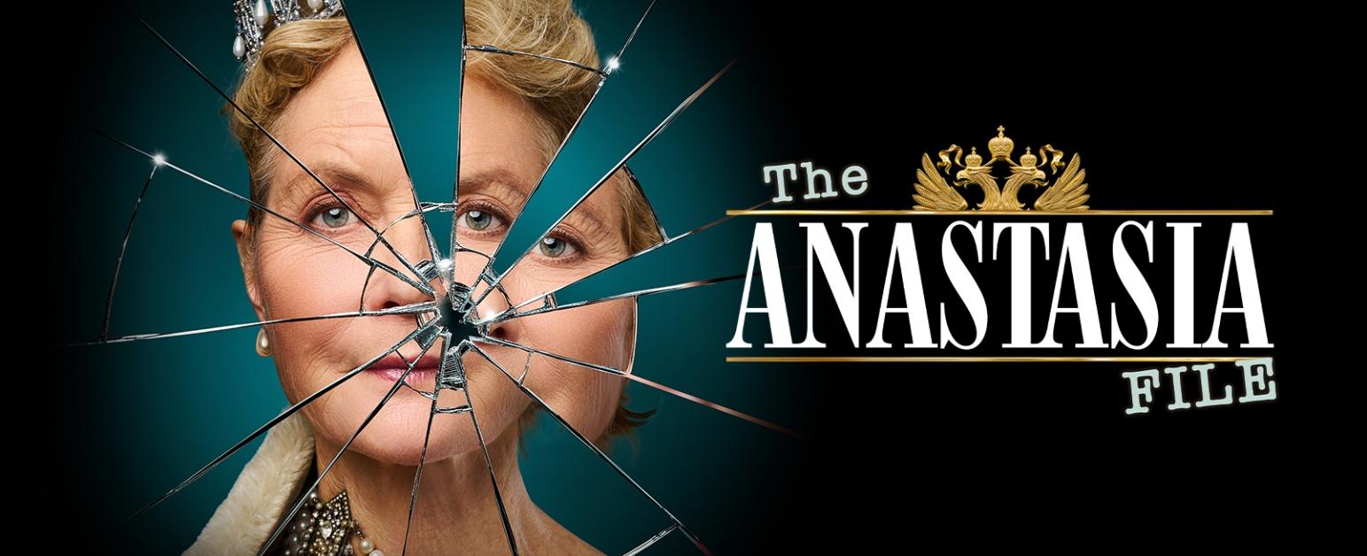 A picture of a womans face fractured into mirror pieces