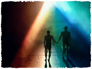 2 dancers holding hands