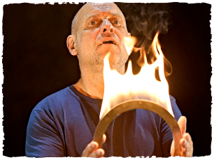 Man holding hoop of fire