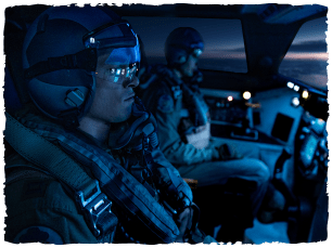 2 men in airplane, blue lighting