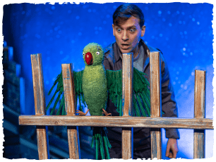 man and parrot