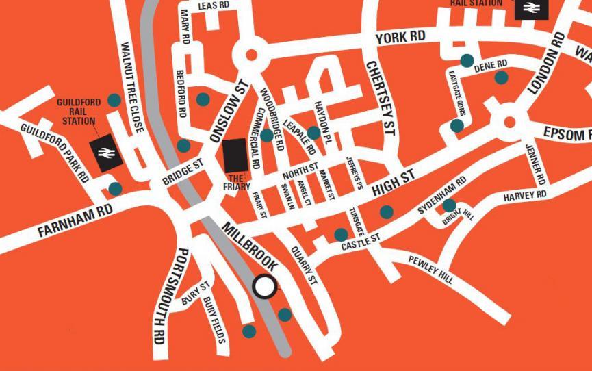 An orange abstract map of Guildford showing the location of the Yvonne Arnaud