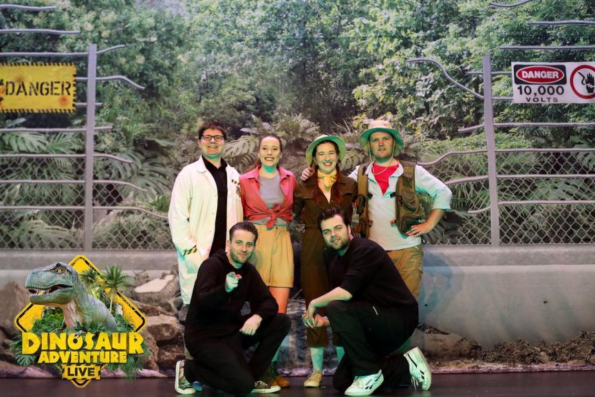 Cast of Dinosaurs Adventure live posing for a photo in rangers gear