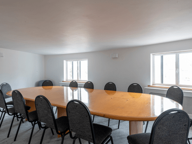 A large table with chairs around it