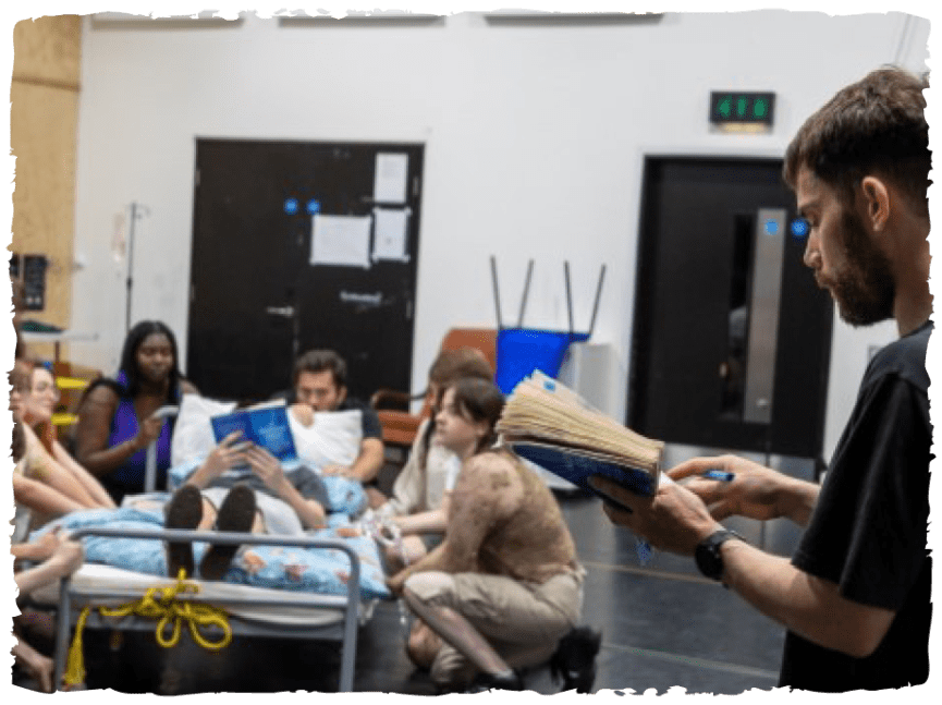 Nathan directing a group of young people