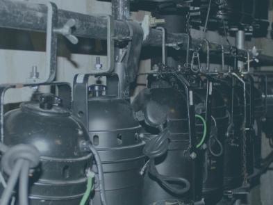 A line of theatre lights hung up 