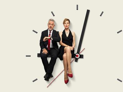 A man and a woman sit on the hands of a clock on a beige background.