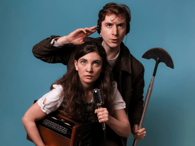2 actors against a blue background holding recording equipment