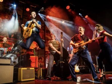 a band performing on stage