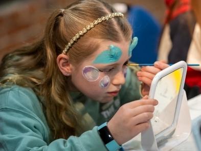 a girl doing make-up