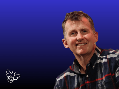 Nigel owens headshot against a blue background