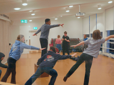 a group of young people in an acting workshop