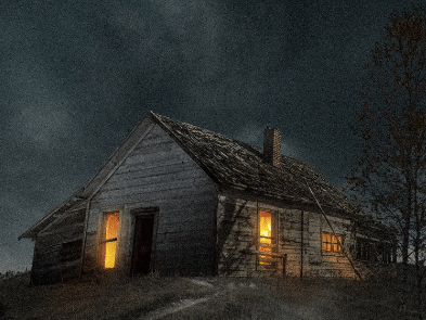 A spooky looking house at night