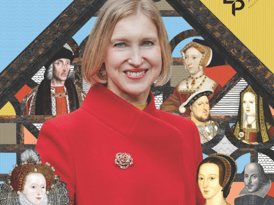 Tracy Borman smiling in red coat